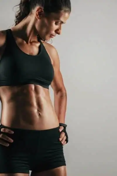 Toning Up at Home: The Ultimate Guide to Bodyweight Exercises 2 Image of woman's toned stomach after bodyweight exercises Harrow and non-surgical treatment from Lipo 360