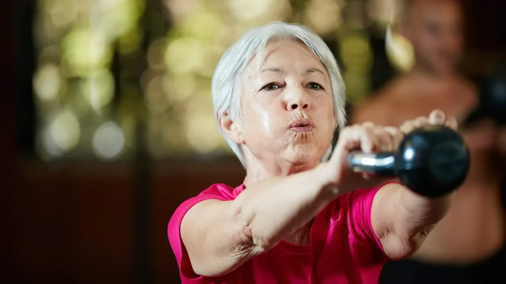 Toning Bingo Wings: Effective Exercises and Tips for Achieving Sleeker Arms 2 Person performing arm exercises with dumbbells Harrow