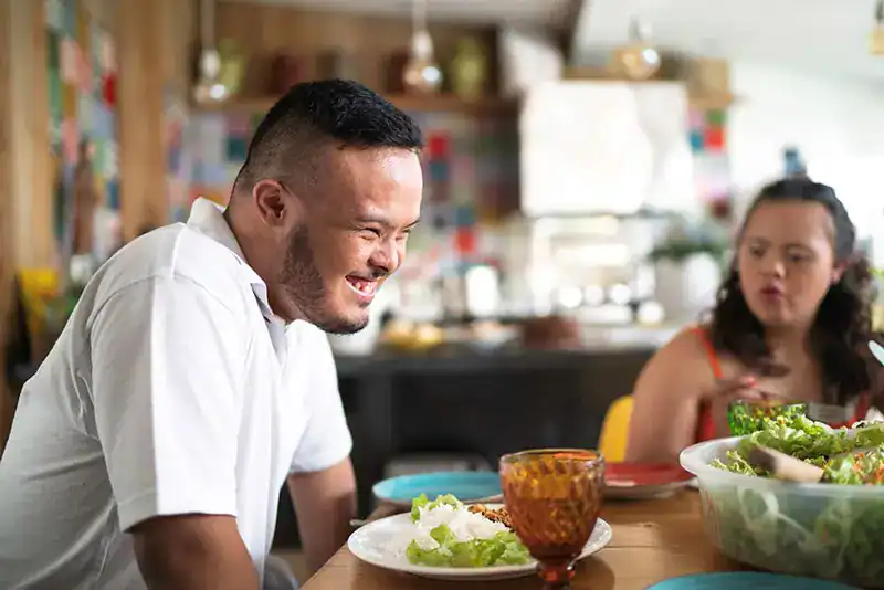 Empowering Weight Loss: A Comprehensive Guide for Individuals with Disabilities 2 Image of a disabled man and balance around nutrition to aid weight loss Harrow