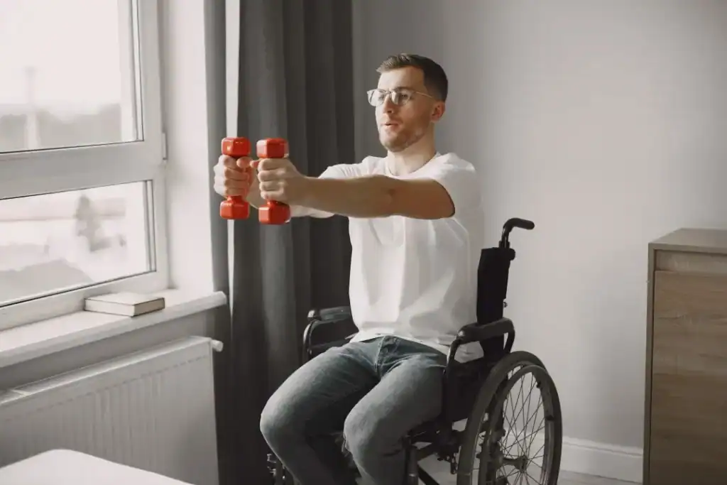 Image of man doing exercise in his wheelchair to aid weight loss Harrow