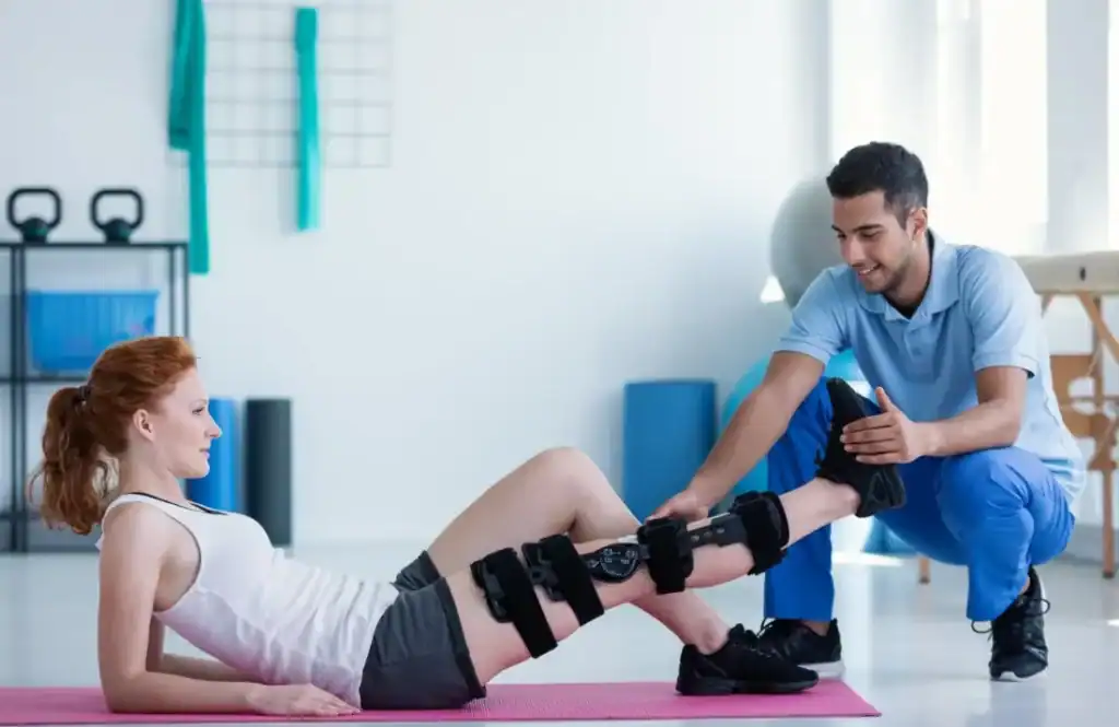 Debunking Meal Timing Myths: The Truth About Muscle Recovery 1 Woman having treatment to help muscle recovery Harrow after an injury