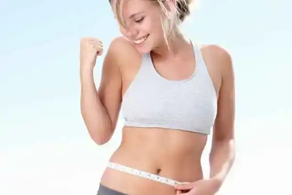 Unraveling the Mystery: Where Does the Body Fat Loss From First? 3 Image of woman happy with fat loss Harrow
