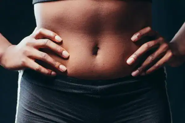 Toning Your Stomach: The Ultimate Guide to Achieving a Sculpted Stomach While Shedding Pounds 1 Image of a toned stomach after non surgical treatment Harrow